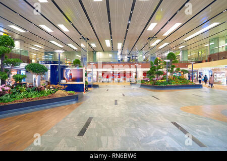 SINGAPORE - CIRCA SEPTEMBER, 2016: inside of Changi Aiport. Changi Airport is the primary civilian airport for Singapore. Stock Photo