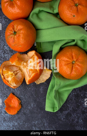 Tangerine (Mandarin) on a dark background Stock Photo