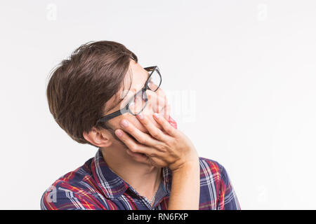 Expression and gesture concept - Handsome man with awkward face Stock Photo