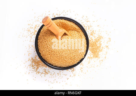 Healthy food concept organic Amaranth grains in black ceramic bowl with copy space Stock Photo