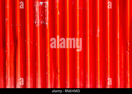 Corrugated iron plate  used in construction works. Red color. Peeled paint. Rio de Janeiro, Brazil. 2019 Stock Photo