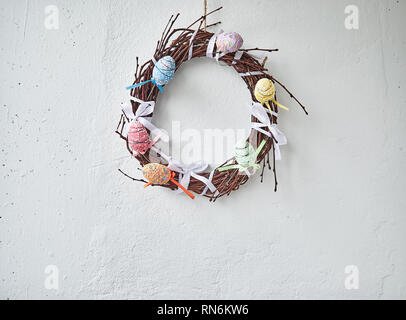 Happy Easter. Congratulatory easter background. Easter eggs and flowers. Stock Photo
