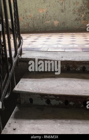 two wooden steps onto a landing in an old eastern european house Stock Photo