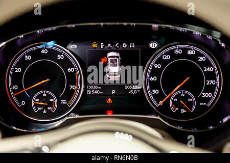 Novosibirsk, Russia - 08.01.18: Interior view with dashboard with speedometer and display of luxury very expensive new black Bentley Bentayga car stan Stock Photo