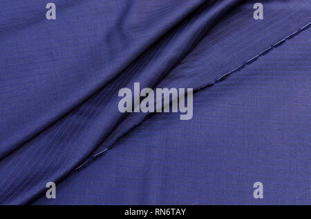 Wool fabric of dark blue color, costume fabric from wool 150 super Stock Photo