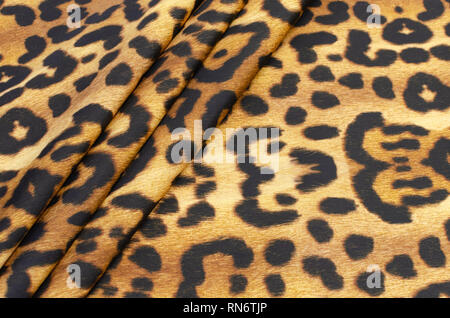 Polyamide fabric with beige-brown leopard print Stock Photo