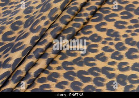Polyamide fabric with beige-brown leopard print Stock Photo