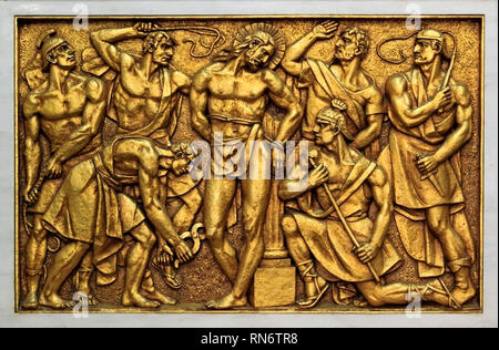 Golden bas-relief of the old Basilica of Fatima representing one of the fourteen mysteries of the rosary, similar to the stations of the cross Stock Photo
