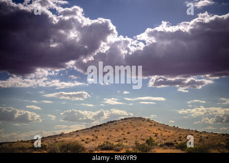 Desert landscape with promising storm clouds Stock Photo