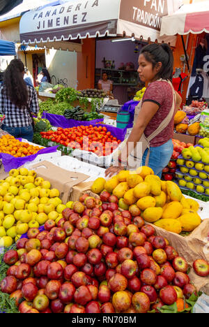 Local woman selling fruits at a traditional Tlacolula market, Oaxaca, mexico Stock Photo