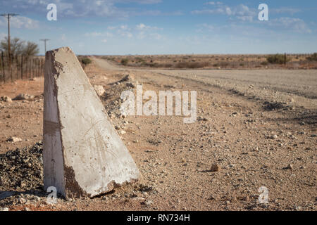 Deserted gravel road in South African desert in Karoo Stock Photo