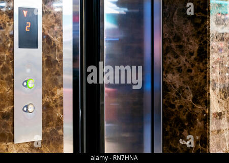 Elevator Button up and down direction. Screen with floor number. Elevator driving direction. Selective focuse Stock Photo