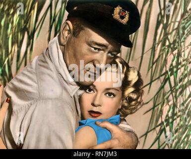 WAYNE,TURNER, THE SEA CHASE, 1955 Stock Photo