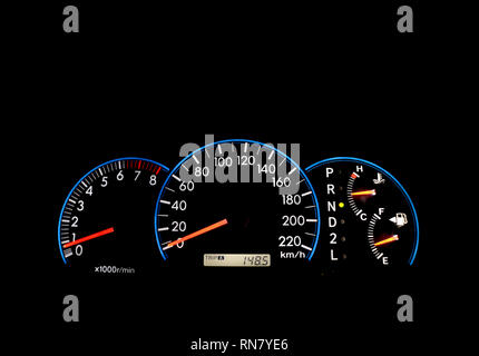 Car dashboard indicators on black panel Stock Photo