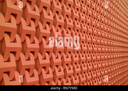 Decorative 3D pattern of building's outer wall in deep orange color Stock Photo