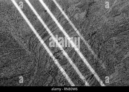Four lanes of light on a marble wall. Sunbeam in marble wall. Abstract black and white texture background Stock Photo