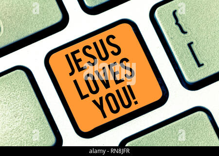 Text sign showing Jesus Loves You. Conceptual photo Believe in the Lord To have faith religious demonstrating Keyboard key Intention to create compute Stock Photo