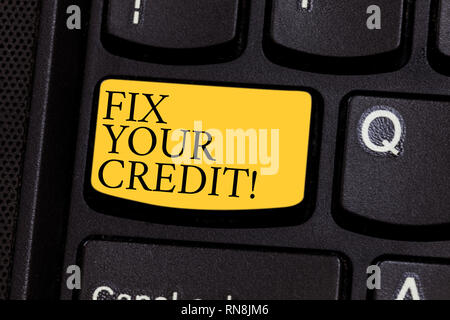 Word writing text Fix Your Credit. Business concept for Keep balances low on credit cards and other credit Keyboard key Intention to create computer m Stock Photo