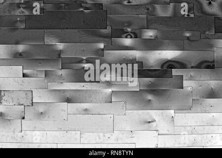 Grey wall made of aluminium sheets Stock Photo