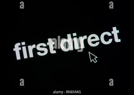 The First Direct logo is seen on an LED screen in the background while ...