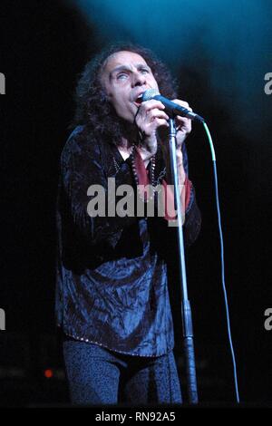 Heavy metal vocalist , Ronnie James Dio, who has performed with Elf, Rainbow, Black Sabbath, and his own band Dio, is shown during a live Dio performance. Stock Photo