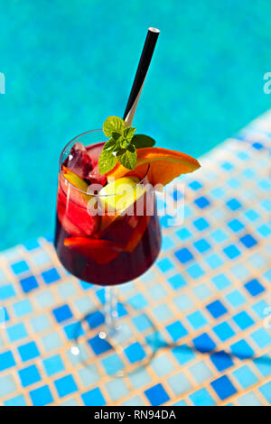 Refreshing classic fruit sangria (punch) by the pool Stock Photo