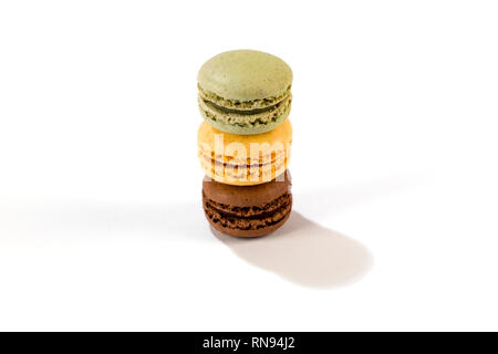 Delicious assorted macarons isolated on white background - french pastries Stock Photo