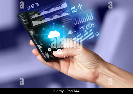 Hand using phone with cloud technology and linked information concept Stock Photo