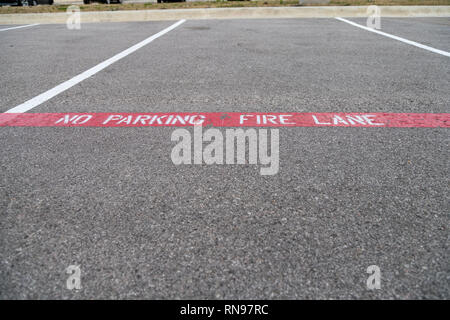 View of Open Parking Spaces With Cars parked on the Other Size Stock Photo