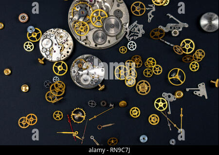wrist watches, clockworks, composition of parts of the clock mechanism. Stock Photo