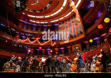 New York, USA. 29th Jan, 2019. Musicians from the Philadelphia Orchestra and Shanghai Philharmonic Orchestra perform during a Chinese New Year concert in Philadelphia, the United States, Jan. 29, 2019. With China in festive mood, cultural activities are being held across the United States. Dragon and lion dances, Peking Opera performances, concerts, fireworks and light shows. a flurry of events in the United States helped people understand the most important festival of China. Credit: Wang Ying/Xinhua/Alamy Live News Stock Photo