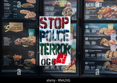 Vallejo, California, USA. 17th Feb. 2019. A protest sign hung on the drive through menu at a Taco Bell in Vallejo, California, where police fatally shot 20-year-old rapper Willie McCoy on Feb. 9. McCoy was allegedly found unconscious in his car in the Taco Bell's drive through lane. Police said he woke up, reached for the gun, and six officers opened fire. Credit: Scott Morris/Alamy Live News Stock Photo