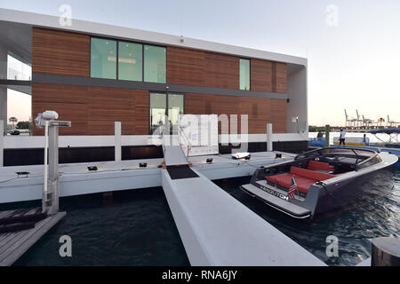 MIAMI BEACH, FL - FEBRUARY 17: Miami-based Arkup LLC is at the Miami Yacht Show from Feb. 15 to 18 displaying this $5.9 million, solar-powered, hurricane-resistant floating home. The off-grid 'livable yacht' can be piloted along coastlines or put down its hydraulic pilings to be as stable as a home on land, on February 17, 2019 in Miami Beach, Florida.    People:  Yacht House Stock Photo