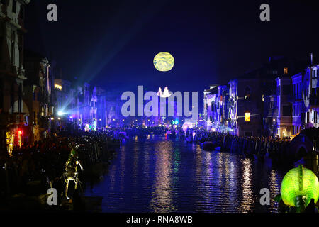 Venice, Italy. 16th Feb, 2019. The Rio di Cannaregio turns into a real water stage with a show that every year attracts thousands of spectators, where floating structures transfer the theme of Carnival to the water. An exciting and spectacular water show curated by Studio Festi and Seconda Materia, where two seemingly opposite realities meet and merge, creating an extraordinary emotional imagery between cyberpunk journeys and dream-like dimensions. Credit: Independent Photo Agency/Alamy Live News Stock Photo