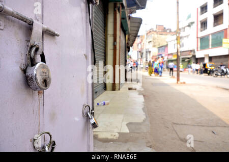 Assam, India. 18th Feb, 2019. Bandh, Guwahati, Assam, India. 18 February 2019. Shops remain closed at Fancy Bazar, in Guwahati on Monday, 18 February 2019 during a bandh to condemn the Pulwama terror attack, called by Confederation of All India Traders. Credit: Hafiz Ahmed/Alamy Live News Credit: Hafiz Ahmed/Alamy Live News Stock Photo