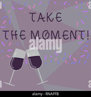 Text sign showing Take The Moment. Conceptual photo Seize the day and opportunity be happy optimistic positive Filled Wine Glass Toasting for Celebrat Stock Photo