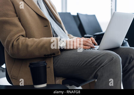 working on laptop, close up of hands of business man. Stock Photo