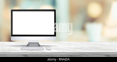 Desktop computer mock up on marble table and blurred soft light table in luxury restaurant with bokeh background. product display template.Business pr Stock Photo