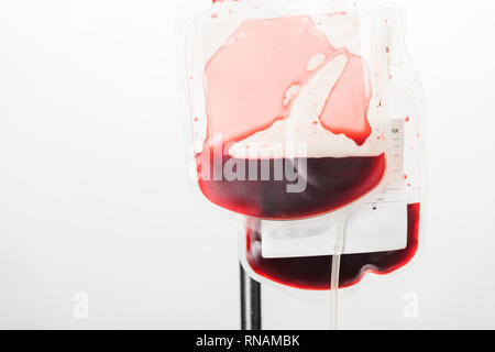 Drips with blood isolated on grey, blood donation concept Stock Photo