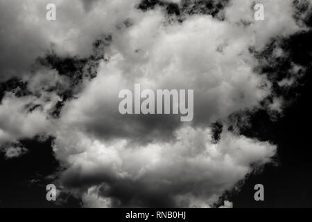 collection of white clouds isolated on black background. Stock Photo