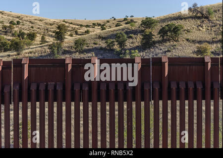 Top of US border fence on Mexico boundary, bollard style pedestrian barrier, viewed from US side, east of Nogales Arizona, April 2018 Stock Photo