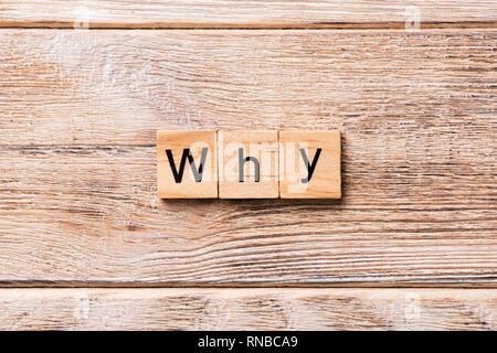 WHY word written on wood block. WHY text on wooden table for your desing, concept. Stock Photo
