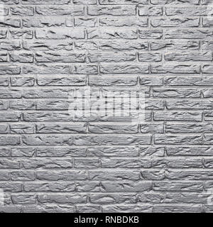 part of silver gray coloured brick wall Stock Photo