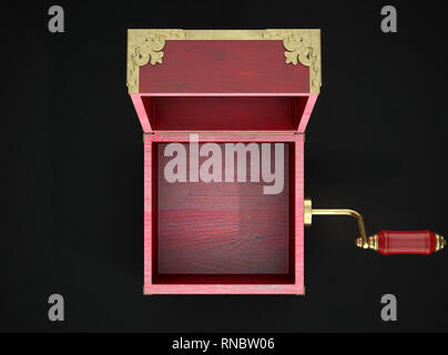 An empty antique open  jack-in-the-box mad of red wood and gold trimmings on a dark studio background under a spotlight - 3D render Stock Photo