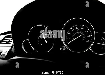 Car dashboard dials - engine RPM and speedometer Stock Photo