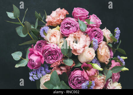 Happy Birthday! Vase with beautiful rose flowers on table near white brick  wall Stock Photo - Alamy