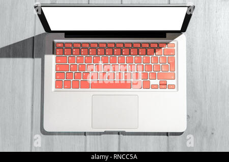 Laptop on wooden table Stock Photo