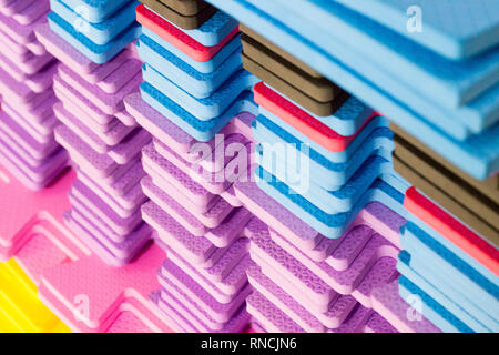 Multicolored EVA Foam puzzle mats stacked. Saara, Rio de Janeiro, Brazil. 2019 Stock Photo