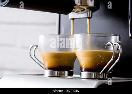 fresh coffee in espresso coffee machine. Panoramic view Stock Photo