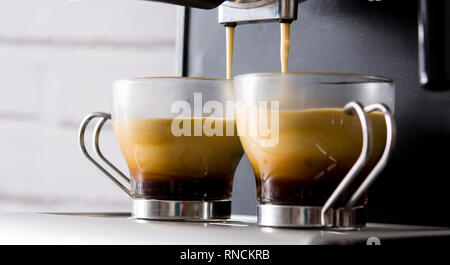 fresh coffee in espresso coffee machine. Panoramic view Stock Photo